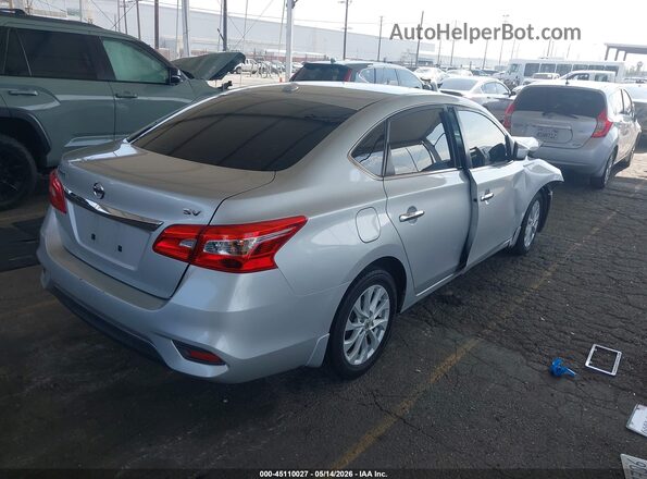 3N1AB7AP1KY404844 2019 NISSAN SENTRA Серебряный Задняя правая четверть