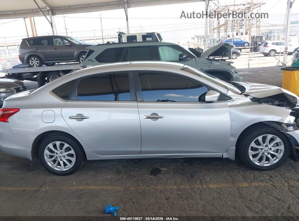 3N1AB7AP1KY404844 2019 NISSAN SENTRA Серебряный Вид задней части салона