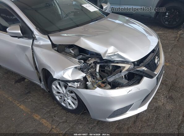 3N1AB7AP1KY404844 2019 NISSAN SENTRA Серебряный Вид спереди