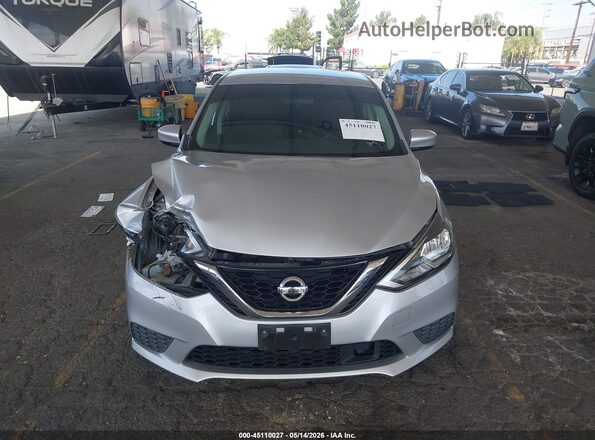 3N1AB7AP1KY404844 2019 NISSAN SENTRA Серебряный Вид щитка приборов
