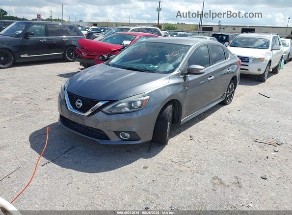 3N1AB7AP2GY338716 2016 NISSAN SENTRA Gray Vista tres cuartos delantera izquierda
