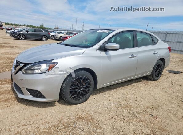 3N1AB7AP2JY230040 2018 NISSAN SENTRA Silver Vista tres cuartos delantera izquierda