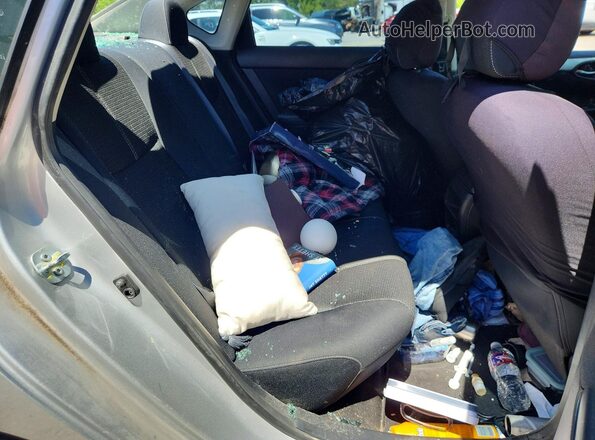 3N1AB7AP4GY260987 2016 NISSAN SENTRA Silver Rear seats view