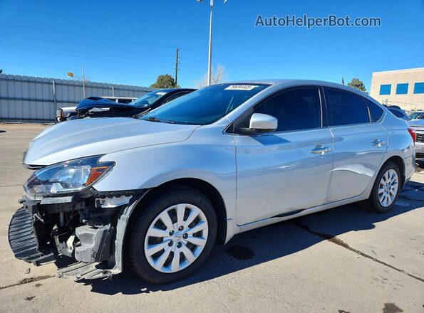 3N1AB7AP4KY426627 2019 NISSAN SENTRA Серебряный Передняя левая четверть