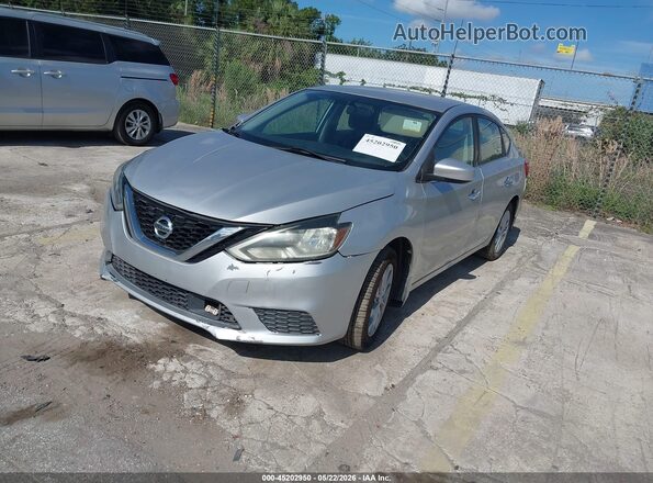 3N1AB7AP5JY217458 2018 NISSAN SENTRA Silver წინა მარცხენა ხედი სამი მეოთხედიდან