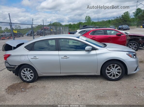 3N1AB7AP5KY328982 2019 NISSAN SENTRA Silver Սալոնի հետևի տեսք