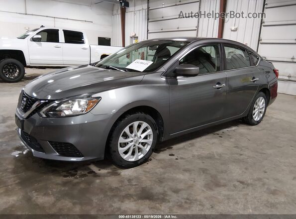 3N1AB7AP7KY370781 2019 NISSAN SENTRA Gray Vista tres cuartos delantera izquierda