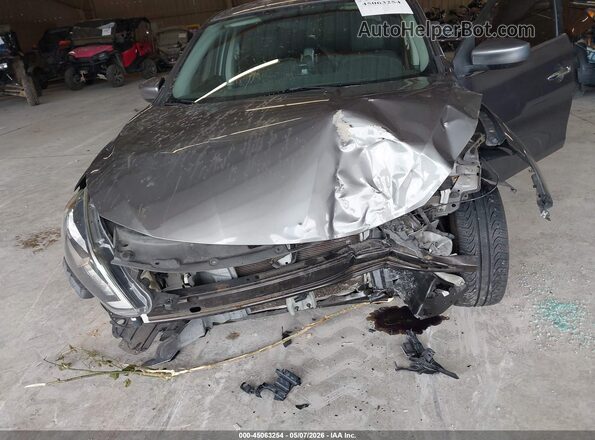 3N1AB7AP8HY211762 2017 NISSAN SENTRA Серый Вид спереди