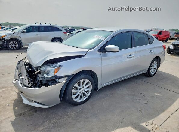 3N1AB7AP8KY425612 2019 NISSAN SENTRA Silver წინა მარცხენა ხედი სამი მეოთხედიდან