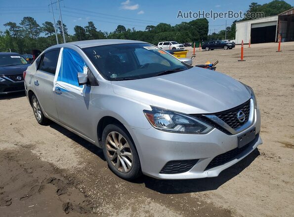 3N1AB7AP9KY347910 2019 NISSAN SENTRA Silver Front right