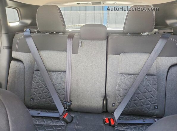 3N8AP6CB8TL372116 2026 NISSAN KICKS White Vista de los asientos traseros