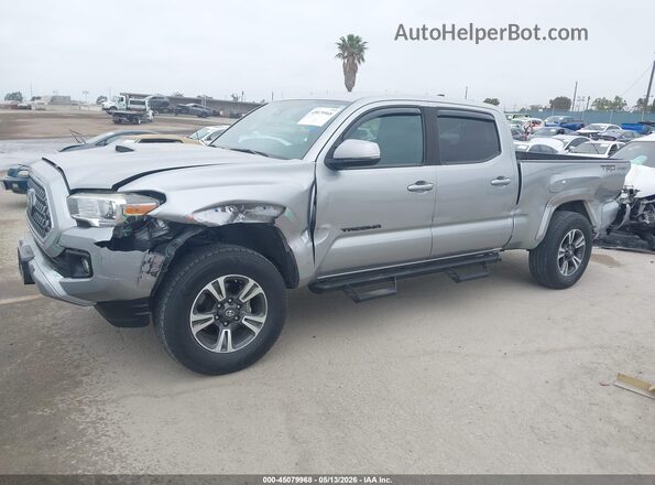3TMBZ5DN3KM021751 2019 TOYOTA TACOMA Silver Vista tres cuartos delantera izquierda