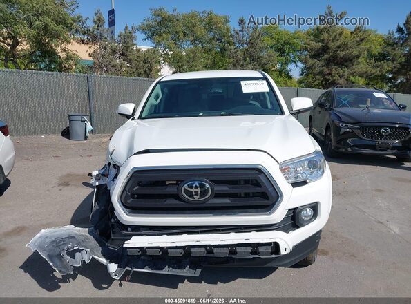 3TMCZ5AN2PM584547 2023 TOYOTA TACOMA White Вид задньої частини салону