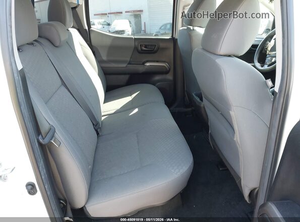 3TMCZ5AN2PM584547 2023 TOYOTA TACOMA White Вид наклейки з VIN-кодом