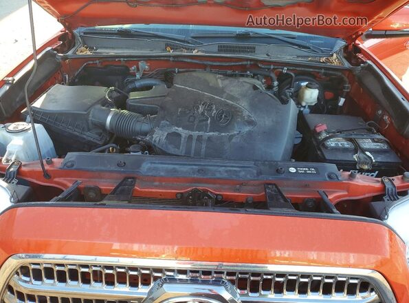 3TMCZ5AN9HM058367 2017 TOYOTA TACOMA Orange Vista interior trasera