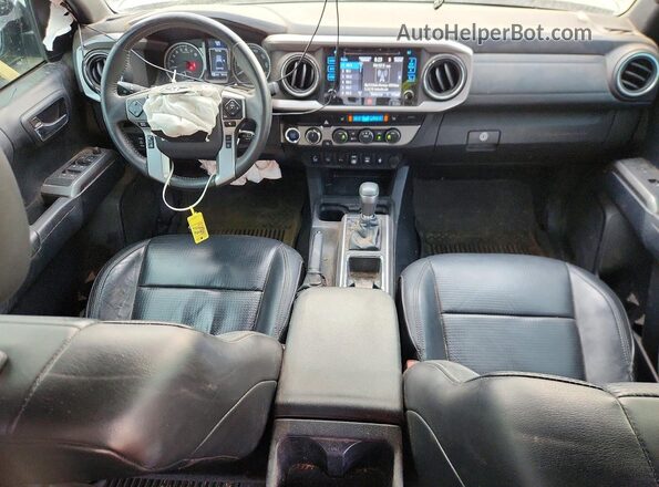 3TMGZ5AN1KM217830 2019 TOYOTA TACOMA Charcoal წინა პანელის ხედი