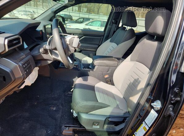 3TMLB5JN0SM153203 2025 TOYOTA TACOMA Черный Вид салона спереди