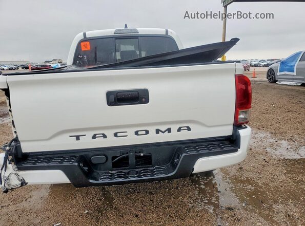 3TYAX5GN6MT015818 2021 TOYOTA TACOMA White Rear view