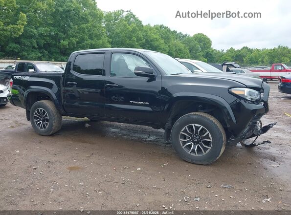3TYCZ5AN2PT154120 2023 TOYOTA TACOMA Черный Вид задней части салона