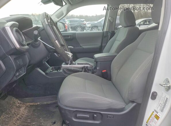 3TYDZ5BN9MT000499 2021 TOYOTA TACOMA White Widok wnętrza z przodu