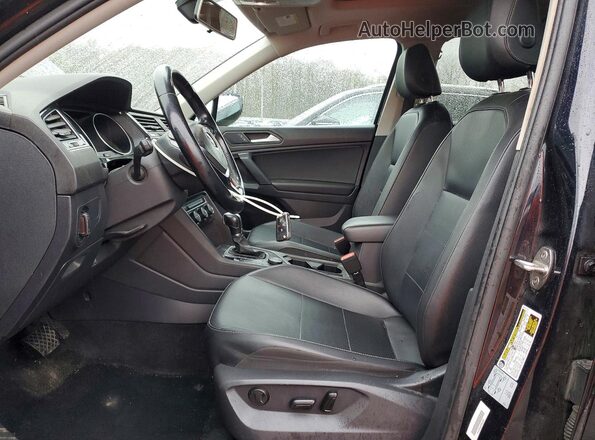 3VV2B7AX1KM063908 2019 VOLKSWAGEN TIGUAN Black Front interior view