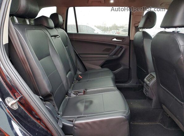 3VV2B7AX1KM063908 2019 VOLKSWAGEN TIGUAN Black Rear interior view