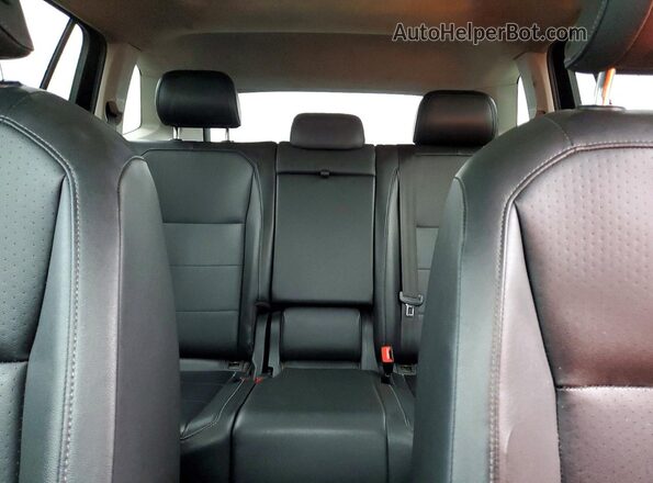 3VV2B7AX1KM063908 2019 VOLKSWAGEN TIGUAN Black Rear seats view