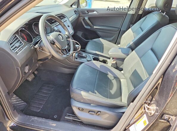 3VV2B7AX4MM093083 2021 VOLKSWAGEN TIGUAN Black Widok wnętrza z przodu