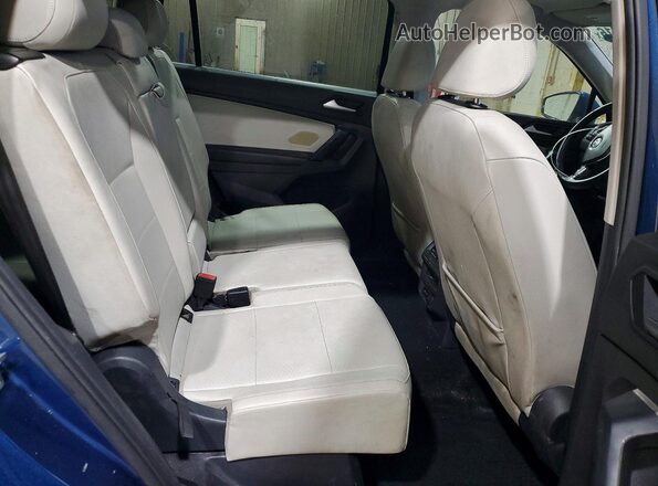3VV2B7AX7KM005981 2019 VOLKSWAGEN TIGUAN Blue Vista interior trasera