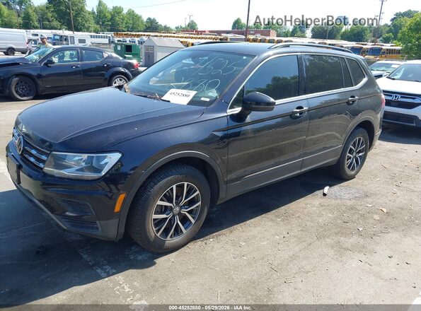 3VV3B7AX0KM090327 2019 VOLKSWAGEN TIGUAN Black Vista tres cuartos delantera izquierda