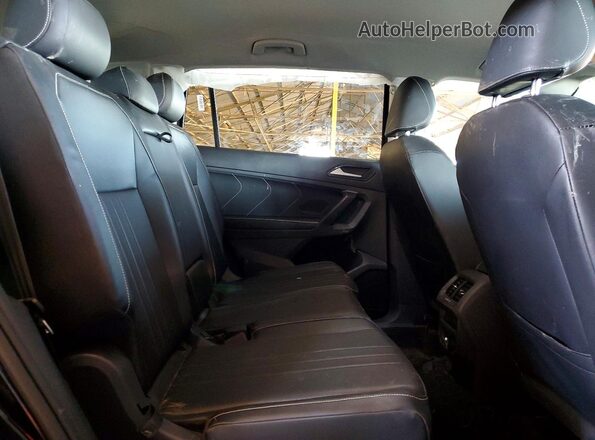 3VV3B7AX0RM135308 2024 VOLKSWAGEN TIGUAN Черный Вид задней части салона