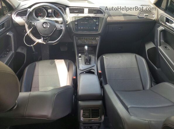 3VV3B7AX6JM103242 2018 VOLKSWAGEN TIGUAN Black წინა პანელის ხედი