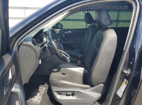 3VV3B7AX6JM103242 2018 VOLKSWAGEN TIGUAN Black წინა სალონის ხედი