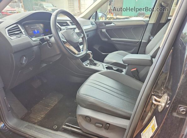 3VV3B7AX6RM046813 2024 VOLKSWAGEN TIGUAN Black წინა სალონის ხედი