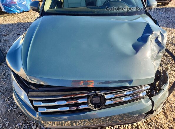 3VV3B7AX9KM137595 2019 VOLKSWAGEN TIGUAN Teal Vista interior trasera