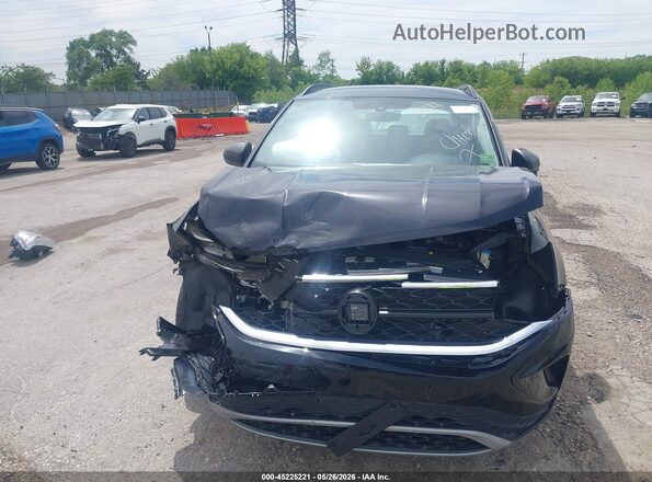 3VVCX7B22PM350707 2023 VOLKSWAGEN TAOS Black Widok wnętrza z tyłu