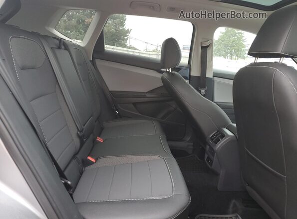 3VVEX7B2XRM103320 2024 VOLKSWAGEN TAOS Серебряный Вид задней части салона