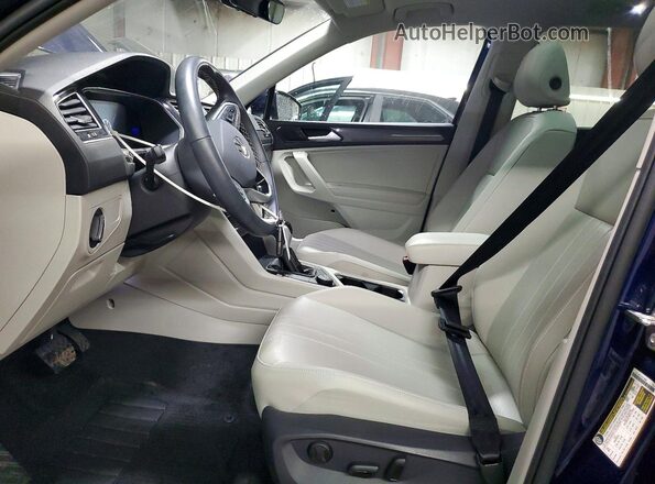 3VVMB7AX4RM037452 2024 VOLKSWAGEN TIGUAN Blue Вид салону спереду