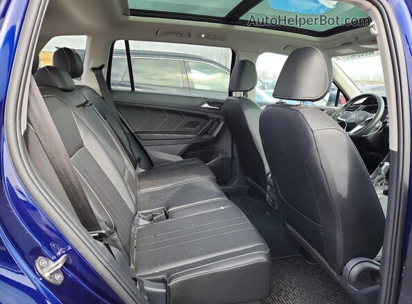 3VVMB7AX5RM172360 2024 VOLKSWAGEN TIGUAN Blue Rear interior view