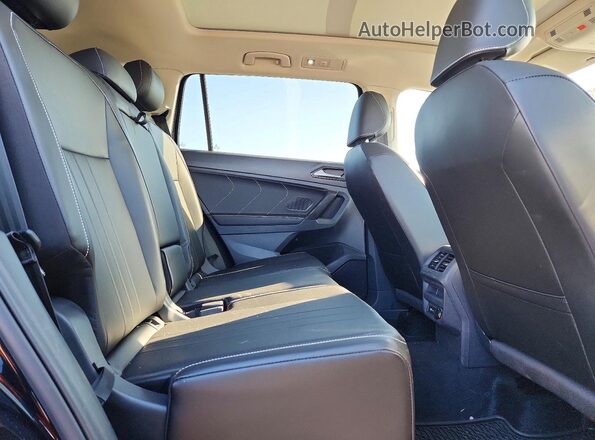 3VVMB7AX8RM086217 2024 VOLKSWAGEN TIGUAN Черный Вид задней части салона