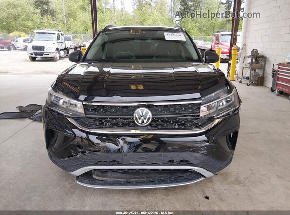 3VVMX7B28NM037159 2022 VOLKSWAGEN TAOS Black ხელსაწყოთა პანელის ხედი