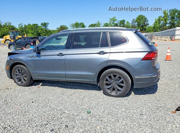 3VVNB7AX6PM079963 2023 VOLKSWAGEN TIGUAN Gray Trasero izquierdo