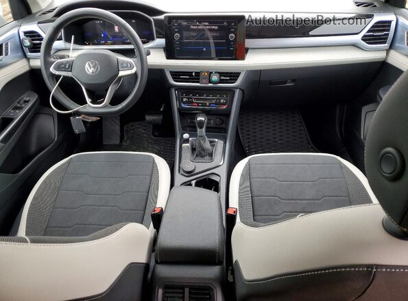 3VVVC7B26SM068115 2025 VOLKSWAGEN TAOS White Dashboard view