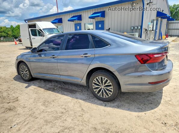 3VWC57BU0MM081654 2021 VOLKSWAGEN JETTA Gray Trasero izquierdo