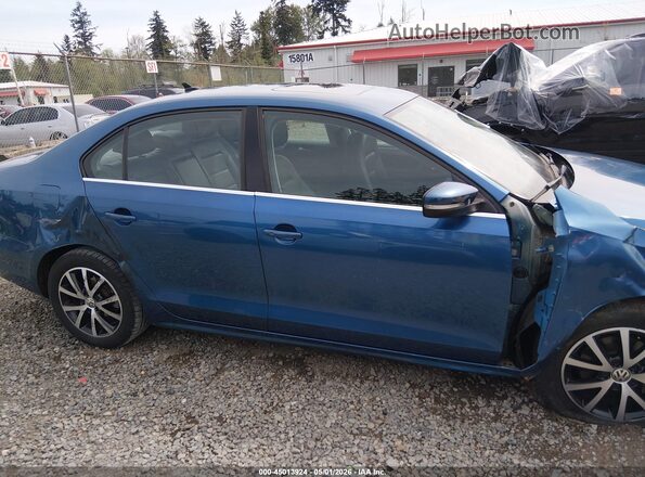 3VWDB7AJ4HM309682 2017 VOLKSWAGEN JETTA Синий Вид задней части салона