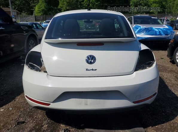 3VWF17AT6HM607227 2017 VOLKSWAGEN BEETLE White Widok z tyłu