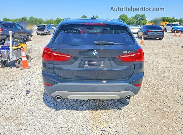WBXHT3C33J5K29491 2018 BMW X1 Black Front interior view