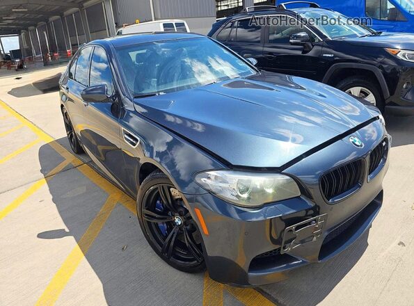 WBSFV9C55GD595740 2016 BMW M5 Gray Vista tres cuartos delantera izquierda