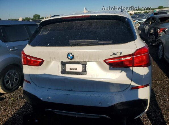 WBXHT3C31H5F80025 2017 BMW X1 White Front interior view