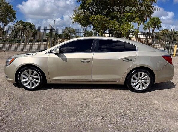 1G4GB5G35GF172002 2016 BUICK LACROSSE Gold Widok naklejki z numerem VIN